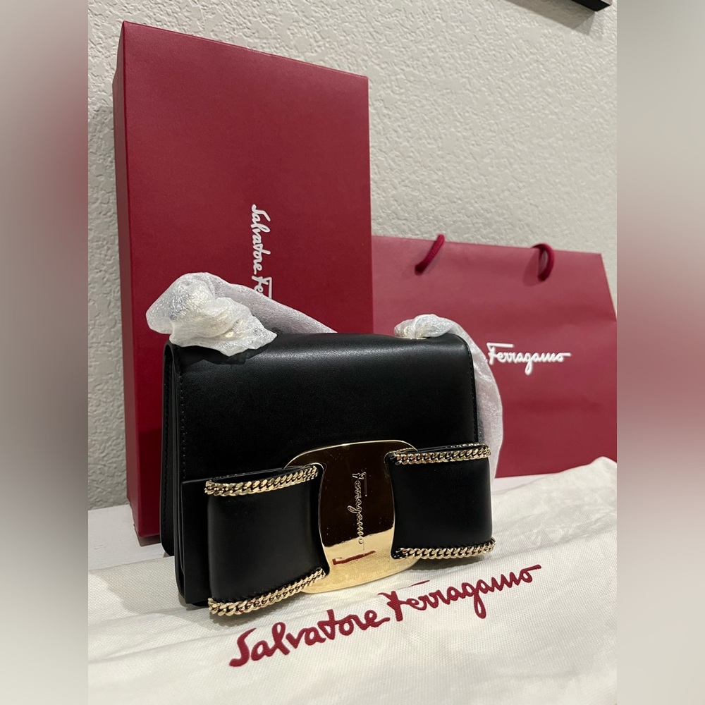 Salvatore Ferragamo Black Clutch with Gold Accents